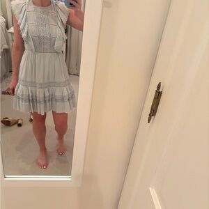 Cute light blue mini dress with lace details